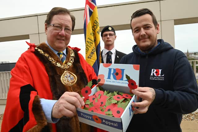 Mayor of Sunderland Cllr Robert Hutchinson with Steven Foster, Sunderland branch chair of the Royal British Legion, with standard bearer Zachary Walker behind.