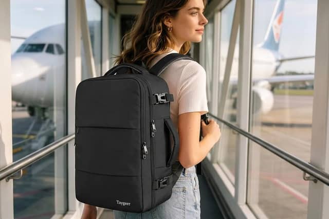 The Taygeer 40 x 30 x 20cm cabin backpack includes a separate shoe pouch, wet pocket and multiple storage compartments.