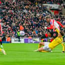 Nilson Angulo has a shot saved by James Trafford. Pic by Chris Fryatt