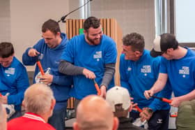 Grundfos workers take part in the football pumping challenge
