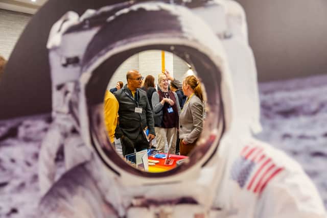 A space to network! Networking at the North East Space Conference, seen through one of the exhibits.
