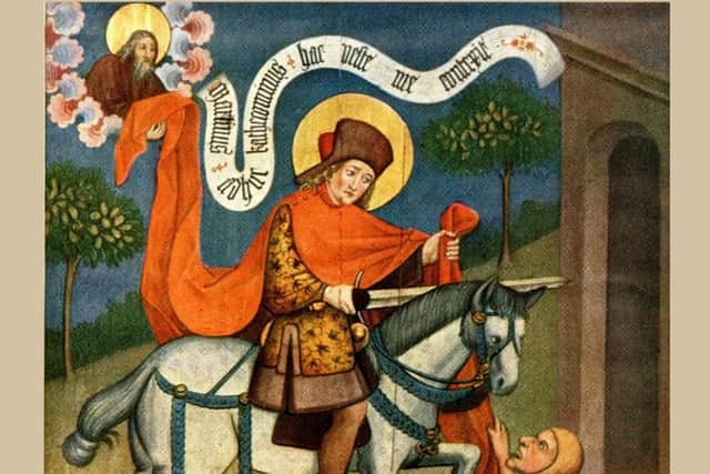St Martin comforts a disabled man