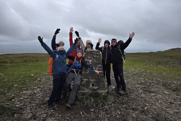 Members of the OnPath Energy team at the summit of Ingleborough