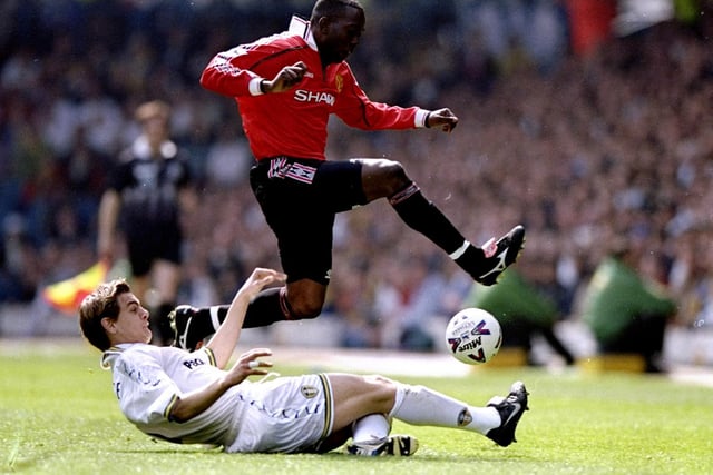 Jonny tries to tackle Manchester United striker Dwight Yorke during the FA Carling Premiership clash at Elland Road in April 1999. The game ended 1-1.