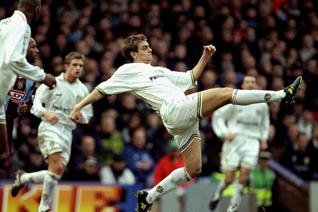 Jonny Woodgate stretches for the ball during the FA Cup fifth round clash against Aston Villa at Villa Park in January 2000. Leeds were edged out 3-2.