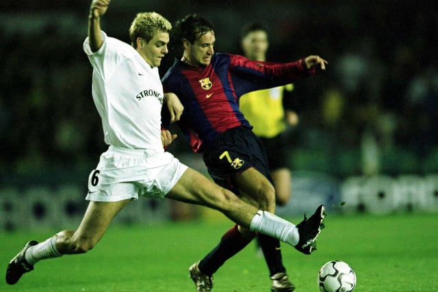Jonny Woodgate clashes with Barcelona's Luis Enrique during the Champions League group H match at Elland Road in October 2000.