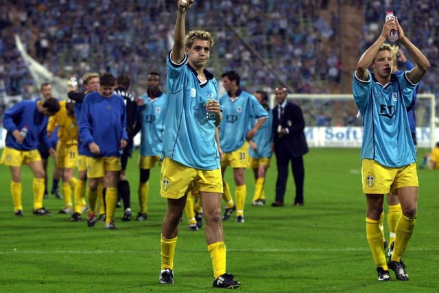Jonny Woodgate and Alan Smith lead the celebrations after Leeds United qualified for the Champions League. They progressed after overcoming 1860 Munich in the third qualifying round, second leg at the Olympic Stadium.