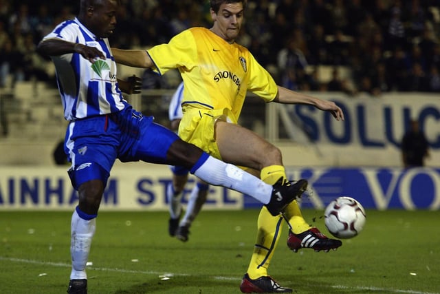 Jonny Woodgate clears the ball as Malaga's Julio Cesar Dely Valdes makes a challenge during the UEFA Cup third round first leg match held at the Estadio de la Rosaleda in November 2002. The game finished goalless.