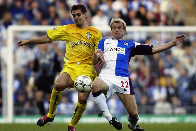 Jonathan Woodgate battles for a loose ball with Blackburn's Egil Ostenstad during the FA Barclaycard Premiership clash at Ewood Park in September 2002.