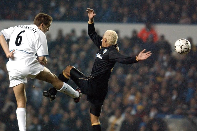 Jonny Woodgate heads for goal past Malaga goalkeeper Dario Silva during the UEFA Cup third round clash second leg clash at Elland Road in December 2002. The Whites lost 2-1.