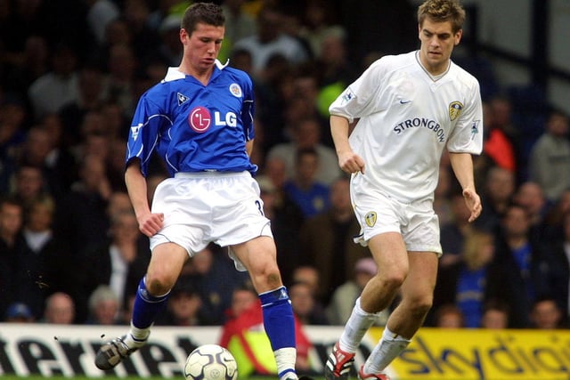 Jonathan Woodgate shadows Tommy Wright.