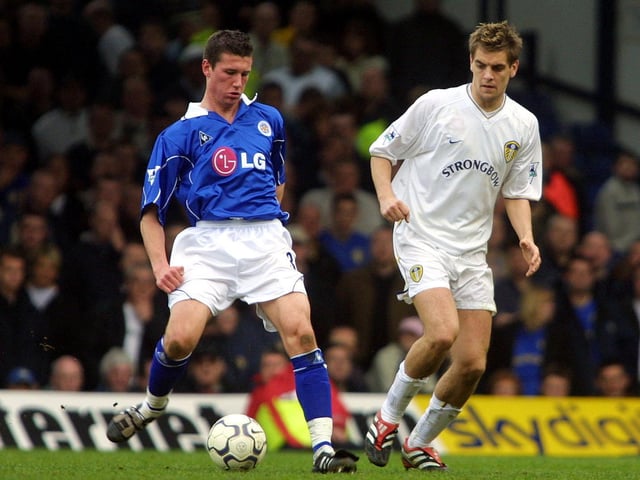 Jonathan Woodgate shadows Tommy Wright.