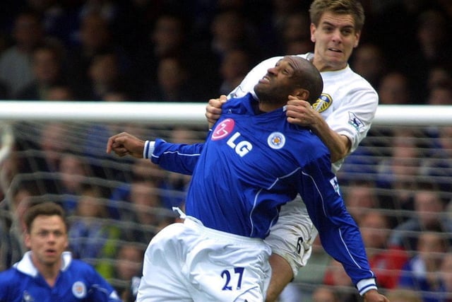 Jonny Woodgate rises above Leicester City striker Brian Deane.