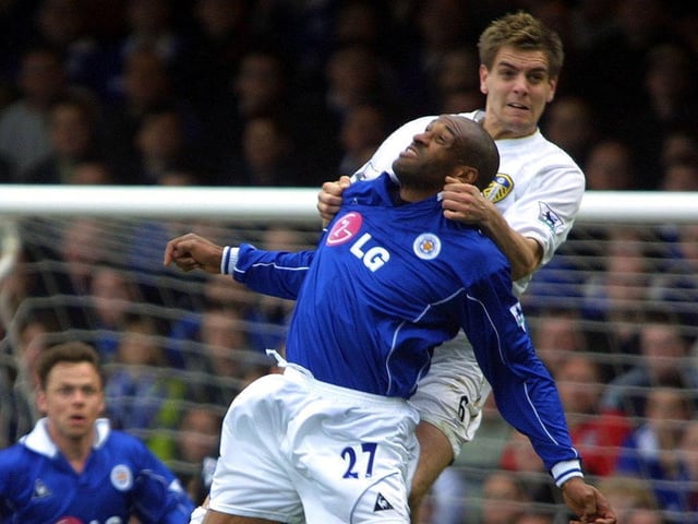 Jonny Woodgate rises above Leicester City striker Brian Deane.