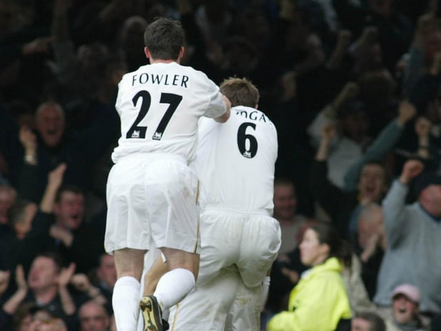 Mark Viduka is mobbed by teammates after he put Leeds United ahead after 18 minutres.