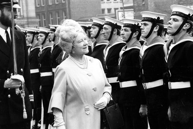 Queen Elizabeth, the Queen Mother, inspects the crew of HMS Ark Royal.
