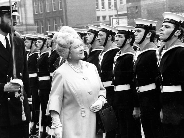 Queen Elizabeth, the Queen Mother, inspects the crew of HMS Ark Royal.