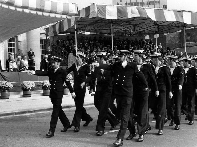 Crew of HMS Ark Royal parade past HM Queen Elizabeth, the Queen Mother outside Leed Civic Hall.