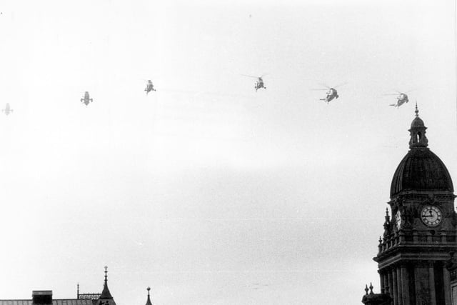 This view shows the flypast of six Royal Navy helicopters. The two in the centre are Wessex, the others are Seakings.