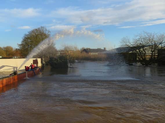 Pumps are in use to reduce the water levels.