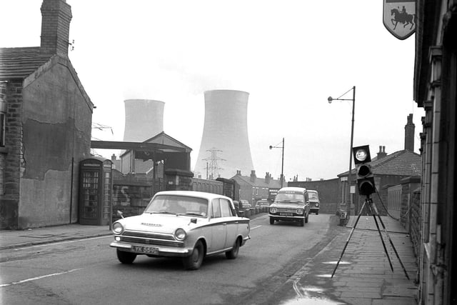 A bridge in Poolstock, Wigan in 1970, with the cooling towers of Westwood power station in the background.