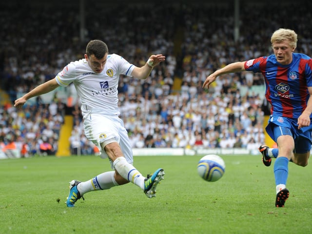 Robert Snograss puts a ball into the box.