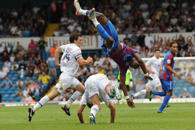All rise. Palace's Wilfried Zaha gets in a tangle.