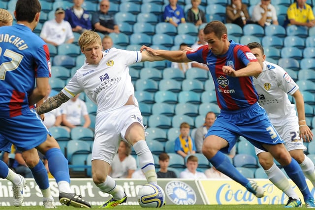 Andy Keogh battles for the ball with Palace's David Wright.