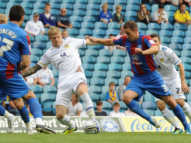 Andy Keogh battles for the ball with Palace's David Wright.