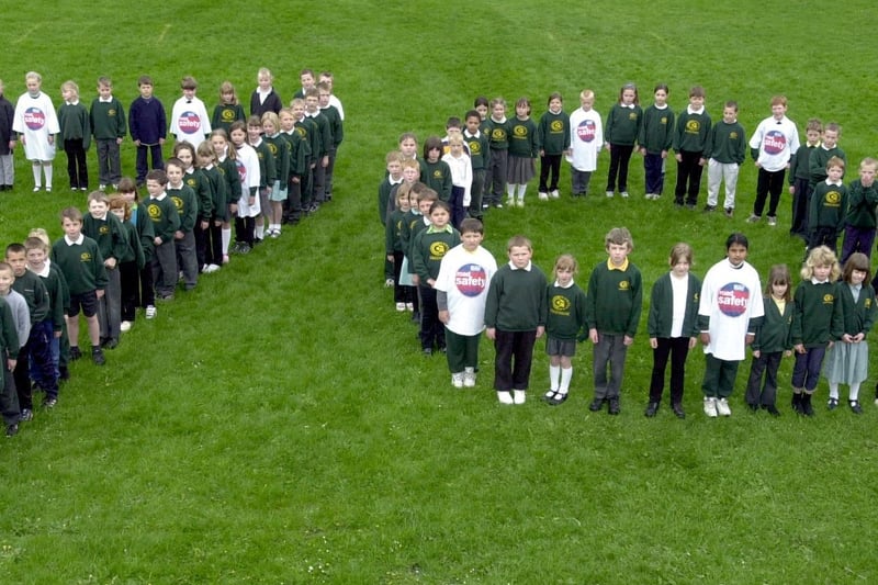 Pupils from Greenside Primary form 70, representing the number of children killed and seriously injured on UK roads each week. The event was organised by Brake as part of Road Safety Week 2000.