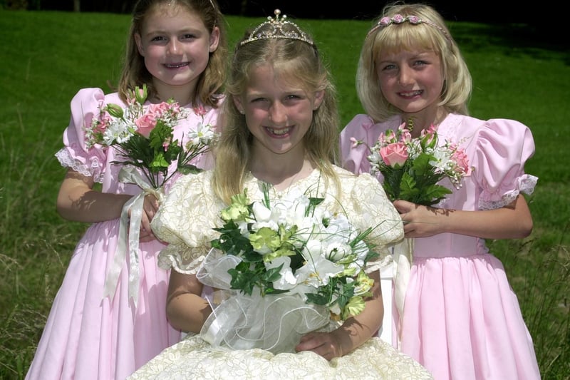 July 2002 and pictured is Rothwell Carnival queen Louise Johnston with her  attendants Sophie Hallos (left) and Shannon Hickey.