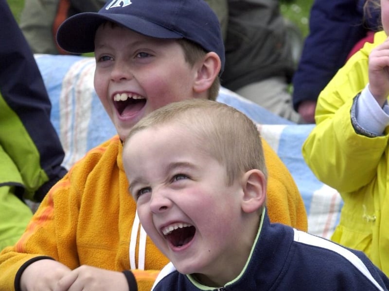 Rothwell May Day Carnival and having a really good time watching the magic show are Andrew Bennett and Bradley Flynn.
