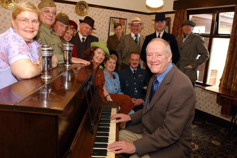 October 2002 and John Boyd from BBC Radio Leeds takes a turn at entertaining the troops after a 1940s nostalgia room was opened at a residential home in Rothwell.