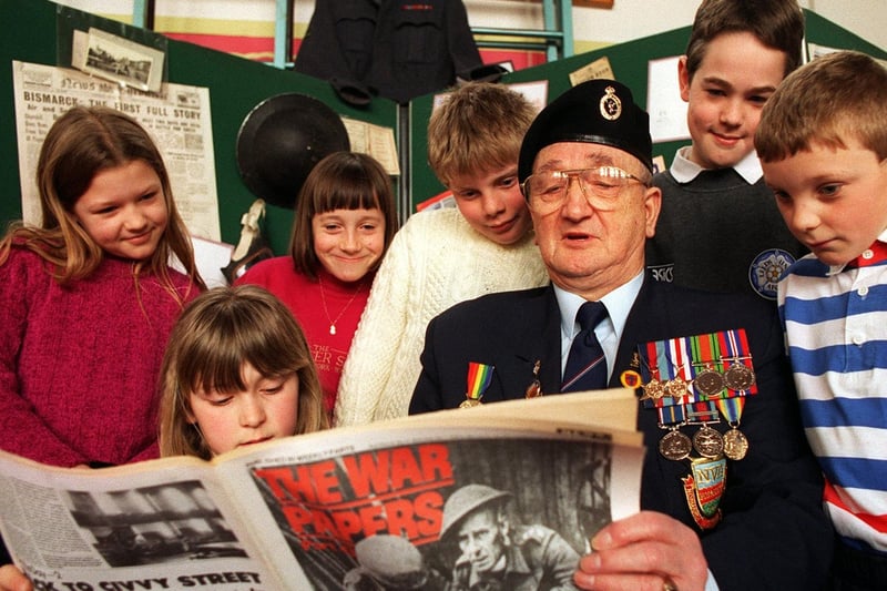Normandy veteran Ken Bell share his experiences with pupils at Templenewsam Halton Primary. Pictured are Gemma Healeas, Stephanie Roberts, Sarah Curtis, Andrew Braham, Michael Steele (Ken's grandson) and Paul Wilson.