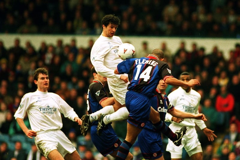 Gary Speed rises high to beat Middlesbrough's Curtis Fleming to the ball.