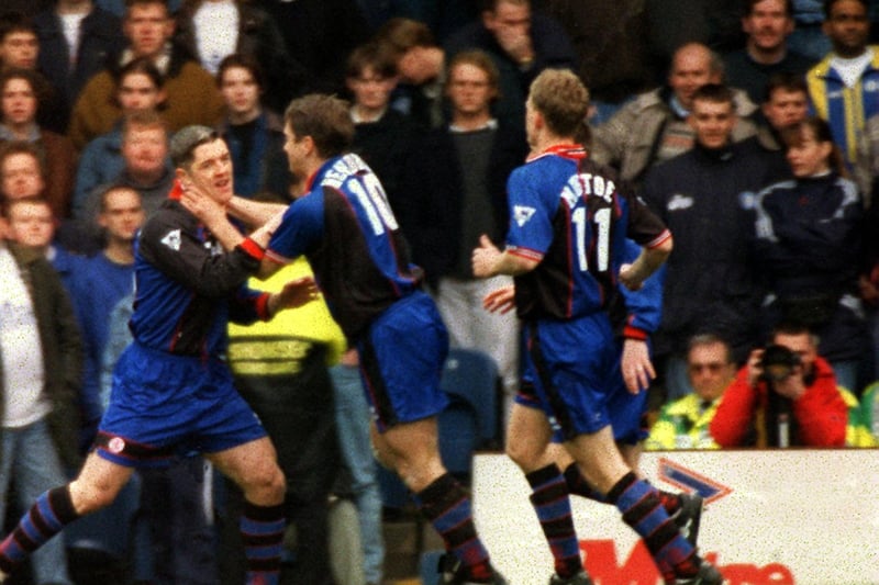 John Hendrie congratulates Graham Kavanagh on scoring the penalty that won the game for Middlesbrough.