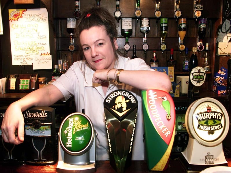 This is Beryl Dixon, landlady of the Newmarket Inn in February 1999. The pub was a quieter after the workmen working on the new A1/M1 link road had finished.