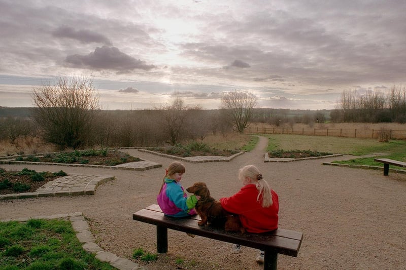 February 1999 and two local children enjoy the award-winning Kippax Park. The 19 acre site had been transformed thanks to the hard work of local unemployed people.