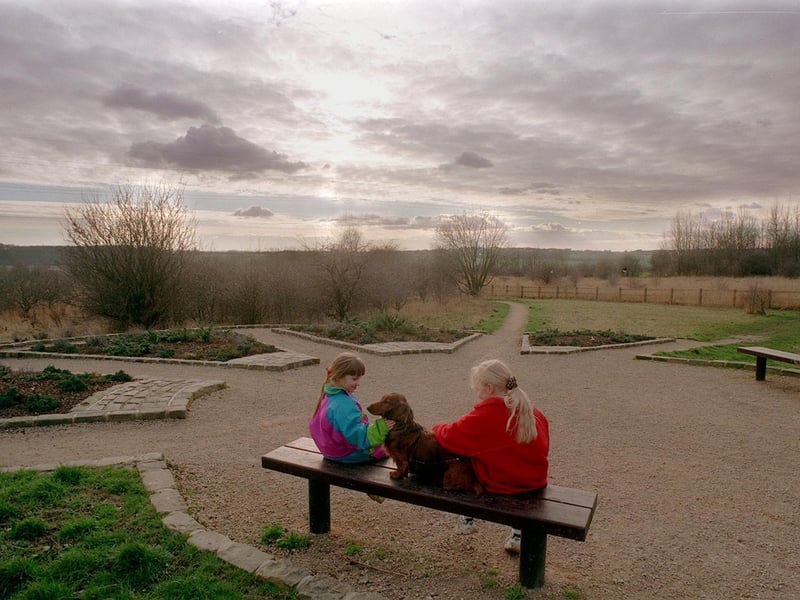 February 1999 and two local children enjoy the award-winning Kippax Park. The 19 acre site had been transformed thanks to the hard work of local unemployed people.