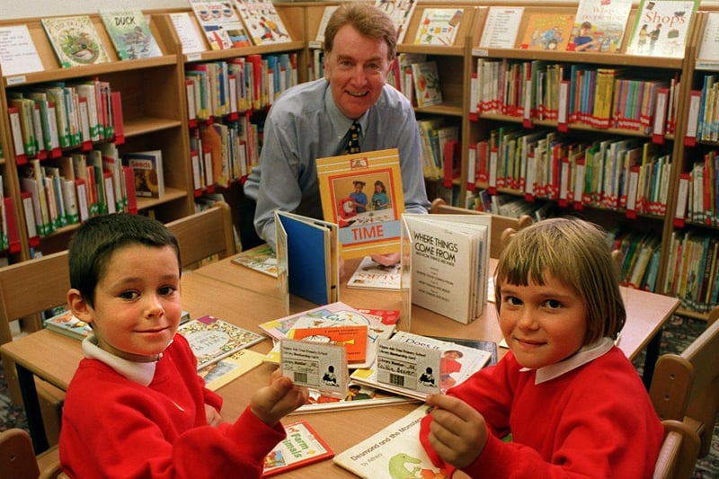 A new library at Ash Tree Primary was opened by MP Colin Burgon. He is pictured with pupils Joe Cooper and Caitlin Beever.