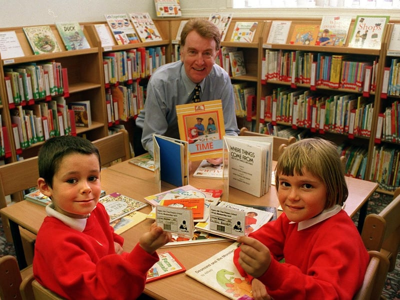 A new library at Ash Tree Primary was opened by MP Colin Burgon. He is pictured with pupils Joe Cooper and Caitlin Beever.