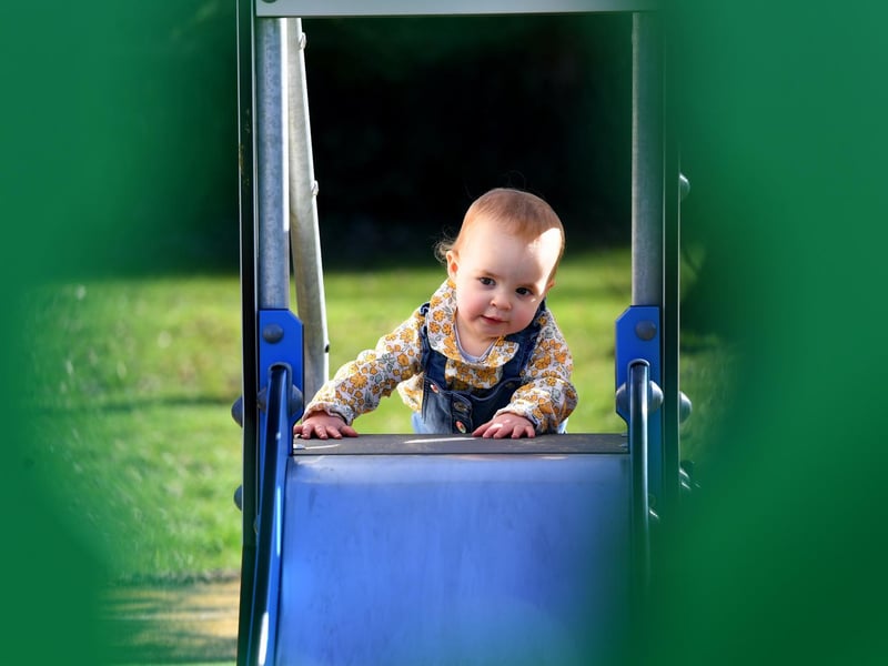 One of the first customers gets to grips with the new play equipment