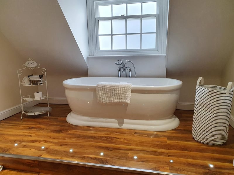 A free standing bath in one of the fourteen en-suite bathrooms.