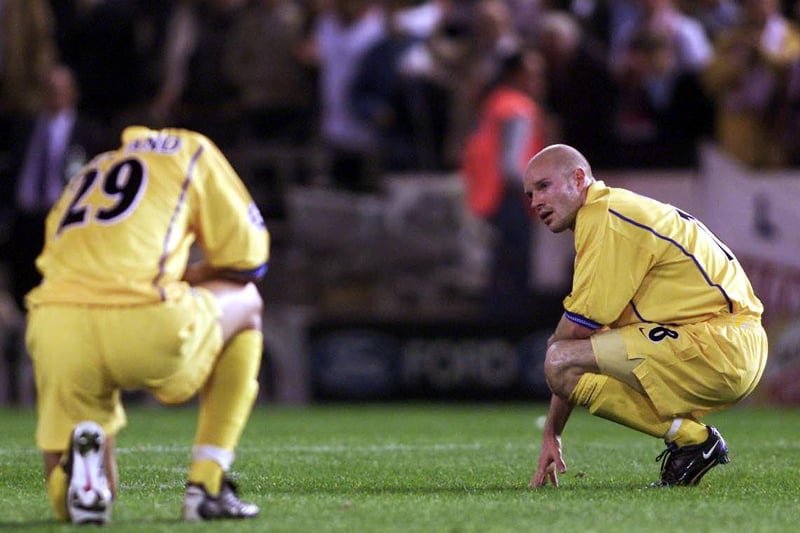 Danny Mills sits dejected with Rio Ferdinand after Leeds United lost 3-0 against Valencia in the Champions League semi-final, second leg at the Mestalla in May 2001.