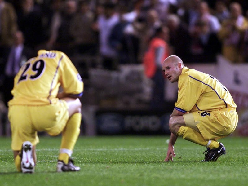 Danny Mills sits dejected with Rio Ferdinand after Leeds United lost 3-0 against Valencia in the Champions League semi-final, second leg at the Mestalla in May 2001.