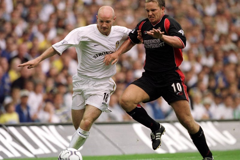 Danny Mills holds off Southampton's Kevin Davis during the Premiership clash at Elland Road in August 2001.