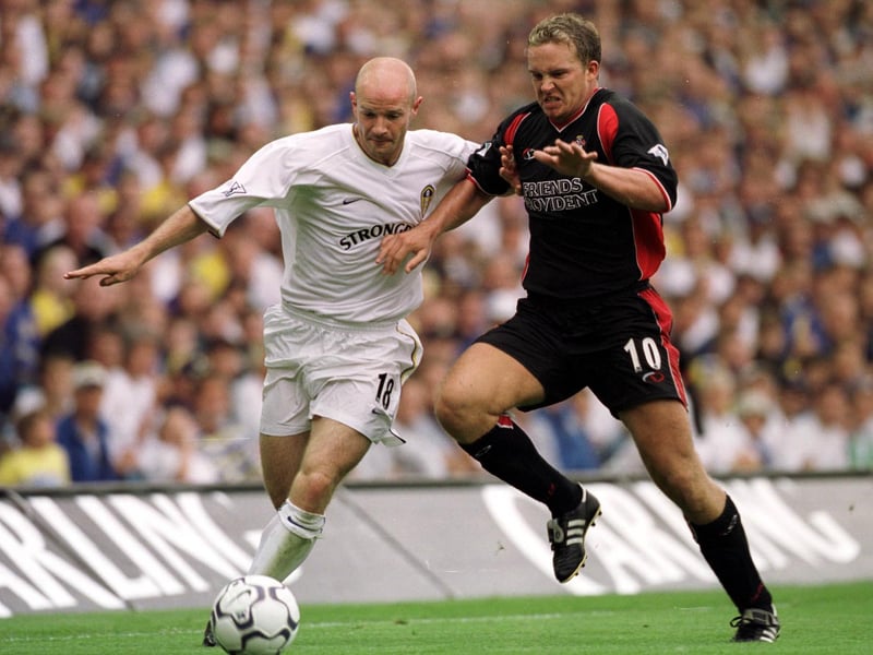 Danny Mills holds off Southampton's Kevin Davis during the Premiership clash at Elland Road in August 2001.