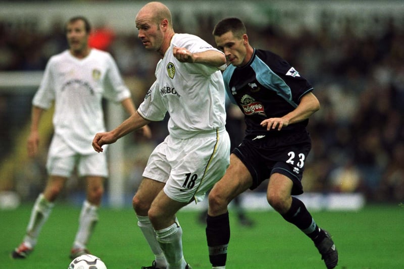 Danny Mills gets away from Derby County's Paul Boertien during the Premiership clash at Elland Road in September 2001.