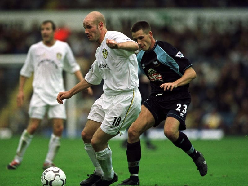 Danny Mills gets away from Derby County's Paul Boertien during the Premiership clash at Elland Road in September 2001.