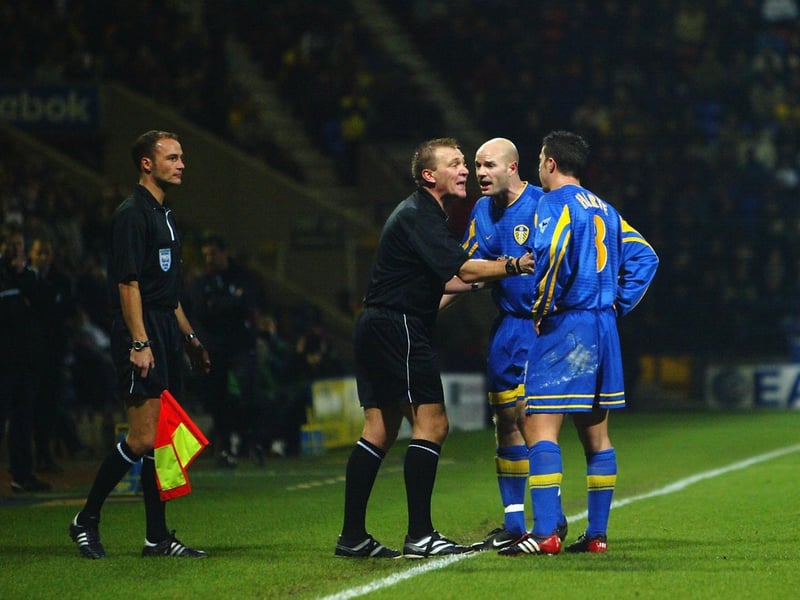 Danny Mills argues with referee Graham Poll during the Premiership clash against Bolton Wanderers in December 2002. He scored in a 3-0 win.